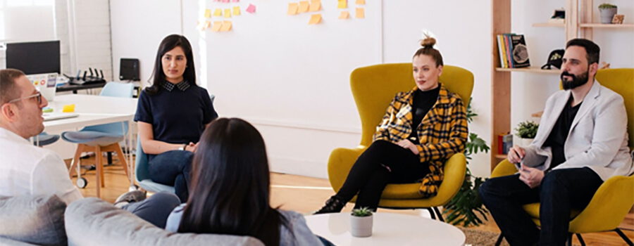 Group of business people in a branding meeting.