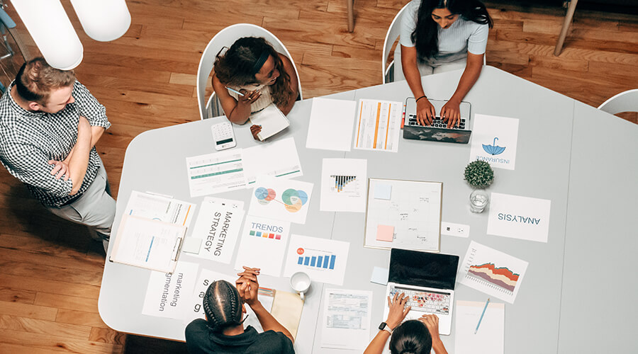 Business meeting around a large table.