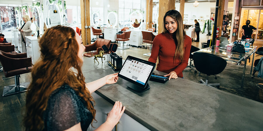 Business interaction between two women.