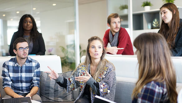 Young professionals holding a business meeting.