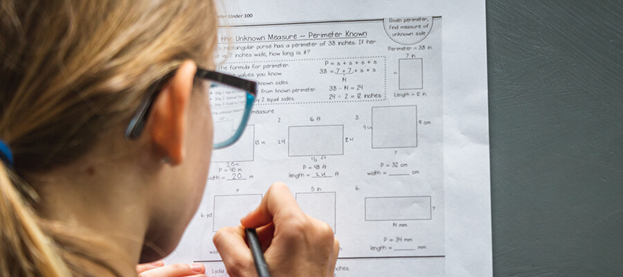 Child working on a numeracy problem.