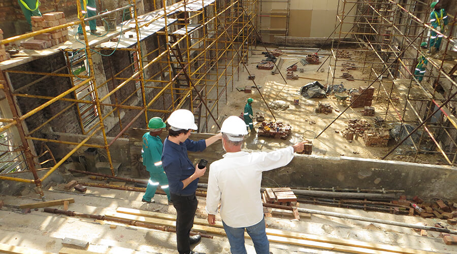 Two people supervising a construction project.