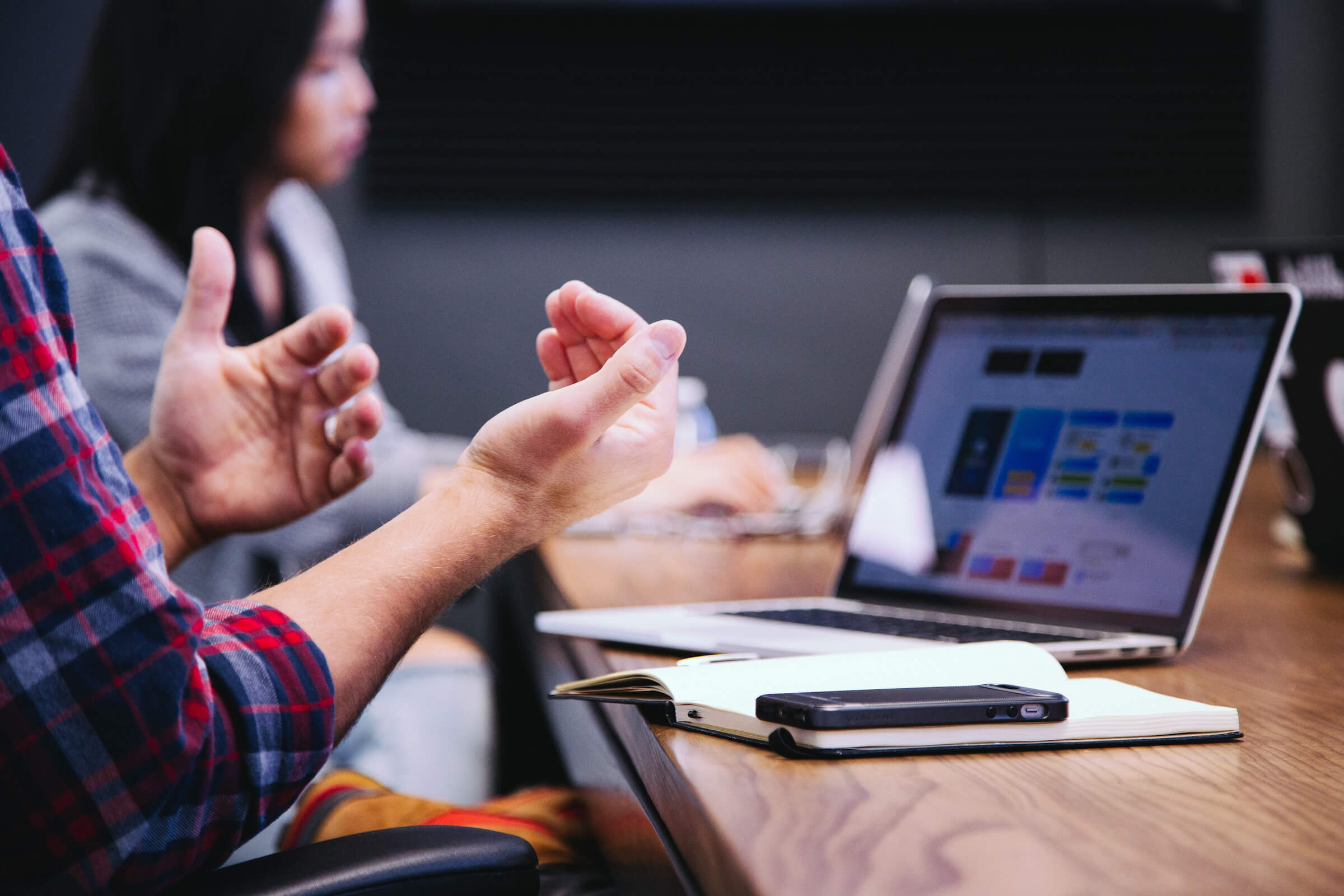 Male hands and equipment needed for online learning.