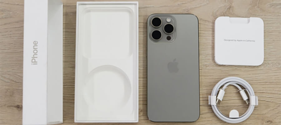 Promo shot of Apple iPhone with box.