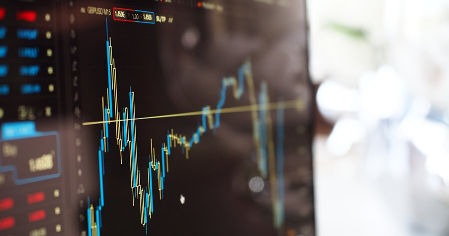 Blurred graph showing financial data.