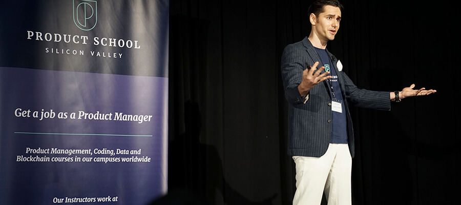 Man presenting at a conference.