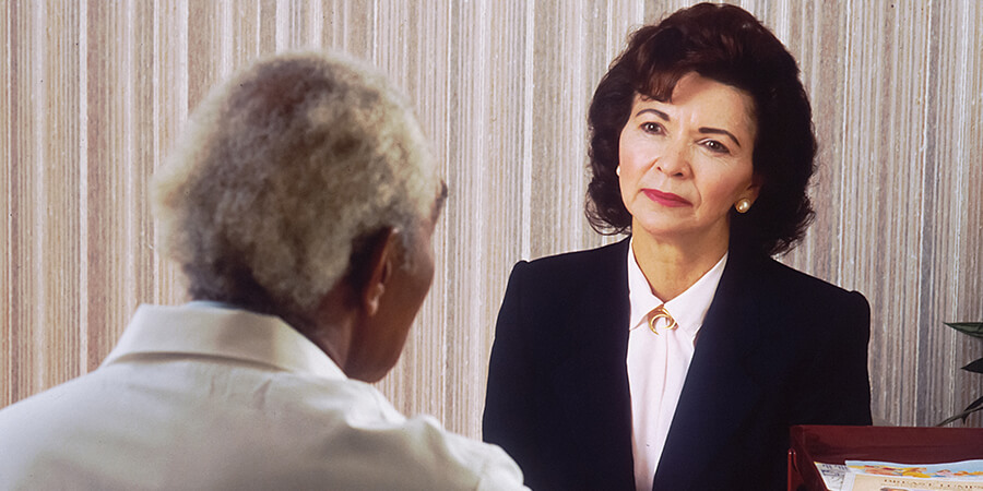 Woman speaking to a therapist.